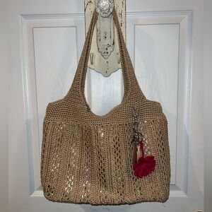 The Sak Crochet Tote Bag with Gold Lining & Charms